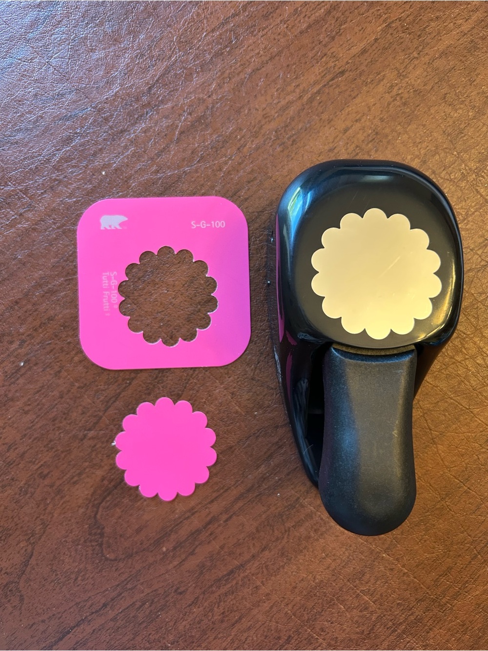 Black Craft Paper Punch with Pink Scalloped Flower Template